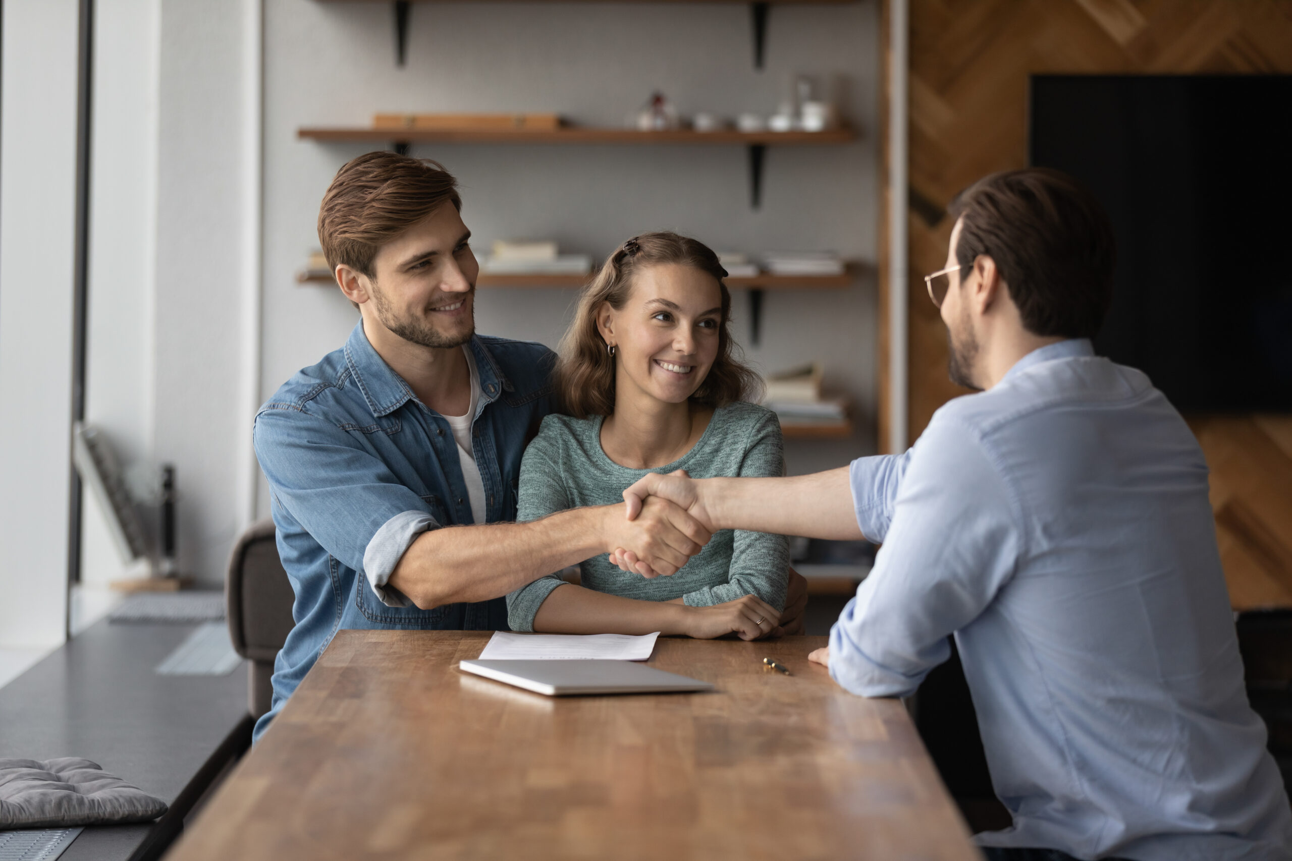 Smiling,Young,Couple,Buyers,Shake,And,Get,Acquainted,Greet,With Smiling,Young,Couple,Buyers,Shake,And,Get,Acquainted,Greet,With